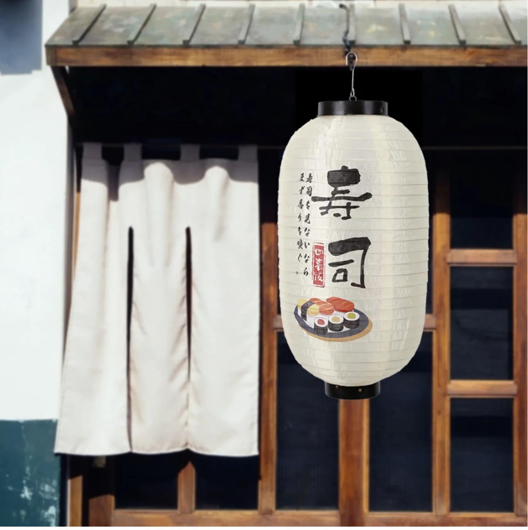 đèn lồng nhật bản trụ oval trắng in kanji sushi treo trước cửa quán gỗ